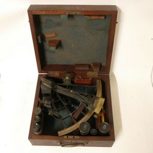 A 19th century sextant and binoculars in case, lacquered brass…
