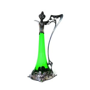 A good WMF Art Nouveau tall claret jug, tapered green glass…