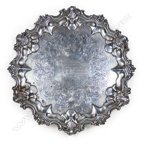 An early Victorian silver salver, pie crust rim with floral and…