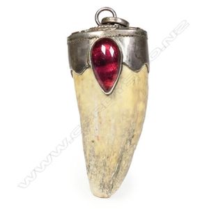 An old small whale's tooth, with substantial silver cap set&hellip;