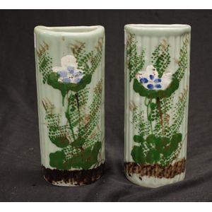 Two antique Japanese pottery wall pocket vases 21 cm high