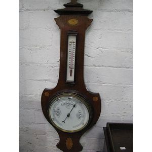 An Edwardian mahogany and inlayed thermometer/ barometer,…