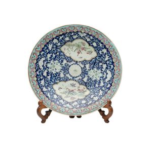 A Chinese Qing Dynasty porcelain famille rose plate decorated…