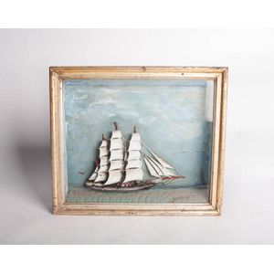 A gilt framed nautical diorama depicting a three masted ship,…