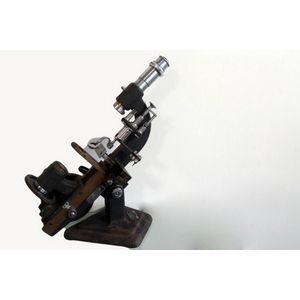 Microscope. Maker: Lensometer. JR. American optical company