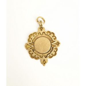 A late Victorian 9ct gold medal, Whh, Birmingham, 1900. Weight…