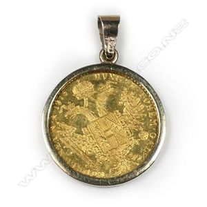 An Austrian 1915 re-strike 1 ducat gold coin, of fineness 0.986.…