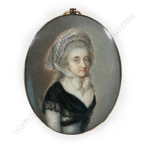 A George III gold framed portrait miniature of a woman, wearing…