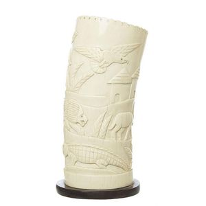 A large African ivory tusk vase, purchased in Zimbabwe 1970,…
