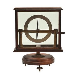 A brass Dip circle in a glazed case maker's mark E.A Machin &…