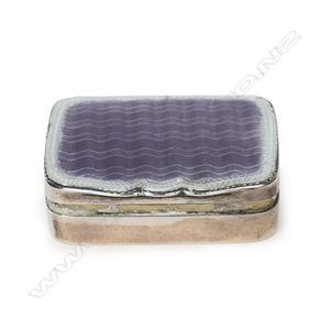 A late Edwardian silver and enamel patch box, the interior with…
