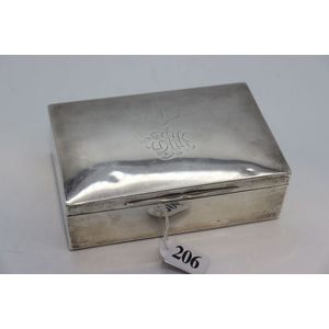 Sterling silver cigarette box, with wooden lining and engraved…