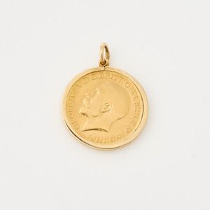1914, full sovereign coin, in 9ct yellow gold frame. Diameter…