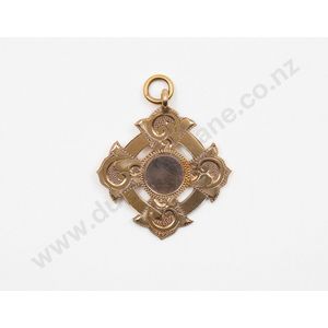 9ct medallion, with reserve inscription stamped 9ct W. Good