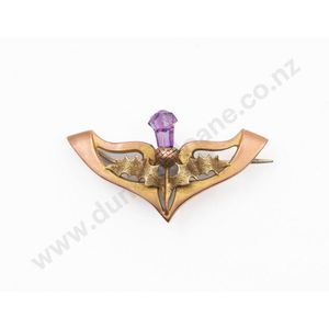 9ct Art Nouveau scroll brooch, with central thistle stamped 9ct…