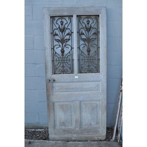 Antique French Art Nouveau entrance door, with two glazed and…