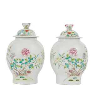A pair of Chinese porcelain jars and covers. Republic period,…