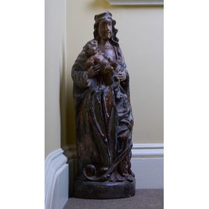 A Continental carved hardwood figure of the Madonna and Child,…