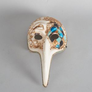 A Genuine Venetian paper mache mask, Manufacturer's wax seal…