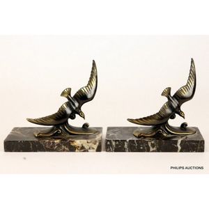 A pair of Art Deco spelter bird bookends, circa 1930, the pair…