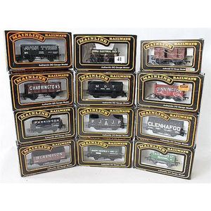 Twelve various Mainline freight models, including shell tanker,…