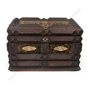 A late 19th century tramp art carved musical jewel box, angled…