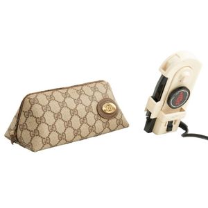 Gucci, travel iron, comprising a Supreme brand Traveller mini…