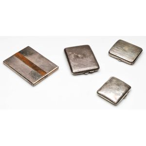 Four early 20th century hallmarked sterling silver cigarette…