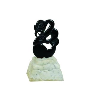 A well carved N.Z. greenstone (nephrite) taniwha sculpture by…
