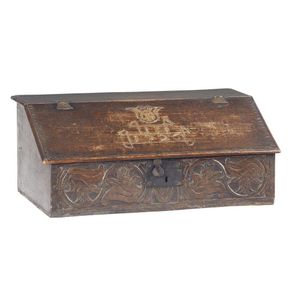 An English carved oak desk box, early 18th century, the moulded…