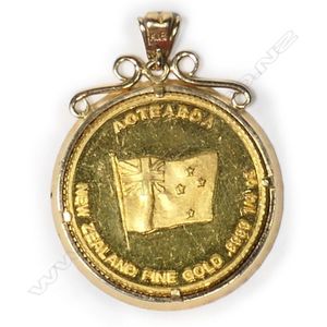 Antique or vintage pendant with coin 