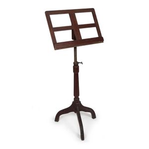 A antique Australian cedar music stand with crab legs and…