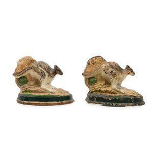 A pair of patinated cast iron kangaroo doorstops, 8 cm high, 10…