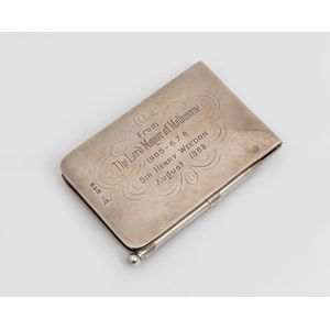 An Edward VII sterling silver pocket notebook and pencil by…