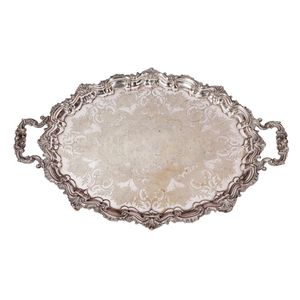 A Victorian silver plated twin handled tray, oval with rocaille…