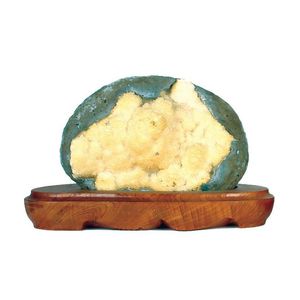 Three mineral specimens of various shapes and sizes, one a…