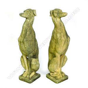 A pair of classical Churchstone greyhounds, in seated position,…