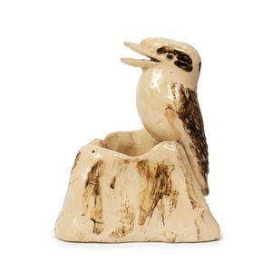 An Australian pottery kookaburra inkwell, the glazed…