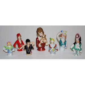 Collection seven various ceramic half dolls height 10 cm tallest