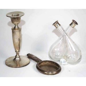 Silver hand mirror frame, candlestick, loaded and an oil…