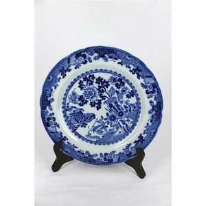 A 19th century English underglaze blue and white plate.…