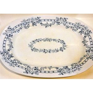 An antique blue and white ceramic meat platter 'Sevres Wreath'