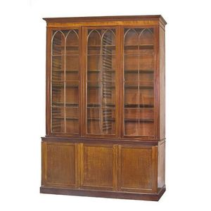 A George III mahogany library bookcase, circa 1810 the moulded&hellip;