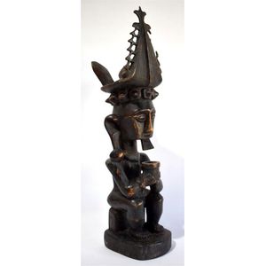 A carved wooden ancestral figure, Nias Island, North Sumatra…