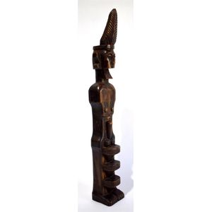 A wooden ancestral figure with prominent sex, Nias Islands,…