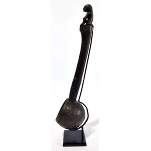 A wooden Balinese spoon with figurine handle, Indonesia, on…