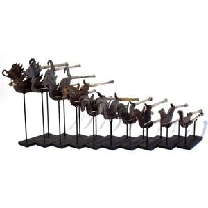 A superb collection of ten graduated metal betel nut crushing…