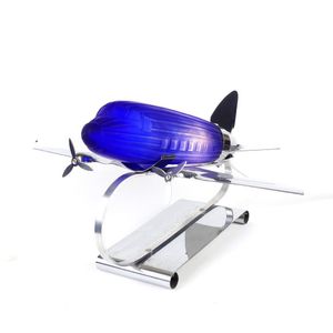 A reproduction Art Deco chrome and blue glass aeroplane desk…