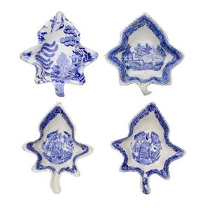 Four blue and white transfer pickle dishes, each in the form of…