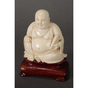 Carved ivory Oriental Buddha - price guide and values